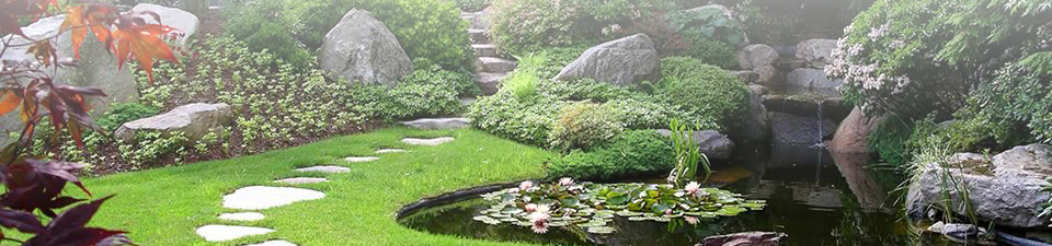 An inviting Japanese garden with winding walkway.