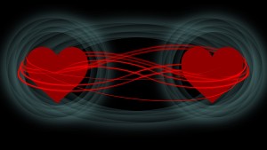 Illustration of quantum entanglement showing two hearts connected.